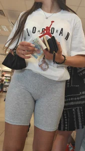 Amazing girl in grey spandex shorts at the mall, closeups of her firm hot ass and her crotch