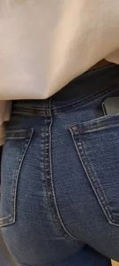 Girl is showing her blue jeans