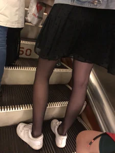 Thin Hot Legs in Black Pantyhose and a Seethrough Skirt on the Subway Escalator Creepshots