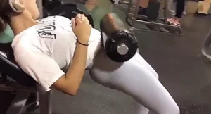 Sexy brunette gym girl in different leggings with a nice ass