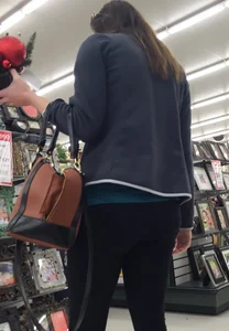 Sexy lady shopping at Walmart in leggings