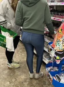 Ass in blue leggings