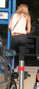 Sexy and slim blonde in see thru leggings with thong