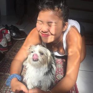 Girl With a Dog Downblouse Peek Photo