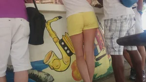 Milf in yellow shorts with vpl and a wedgie