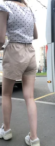 Cute Girl in a Blouse and Shorts With Thin Legs Bus Stop Candid Photo Gallery