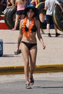 Girls in bikinis getting ready for tubing