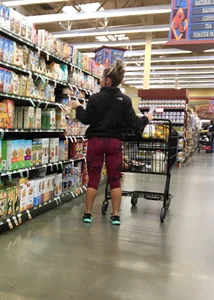 Milf grocery shopping in red leggings with a great ass