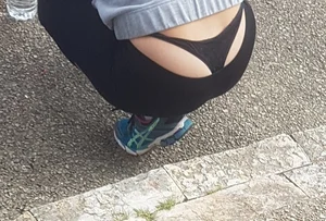Short haired milf sitting showing her thong