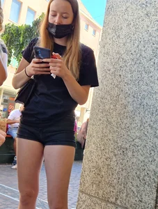A Masked Girl in Denim Shorts With Sexy Legs Street Creepshots Gallery