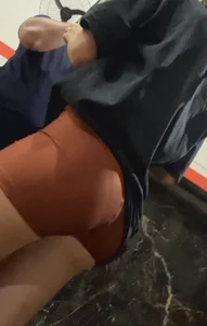Skinny with hot ass in brown shorts