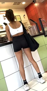 hot petite Indian chick showing some T&A in skimpy workout clothes