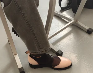 Closeups of a Candid College Teen's Feet in Black Pantyhose And Boots, Sitting in Class