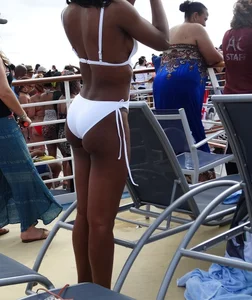 Sexy Ebony babe on a cruise in white bikini