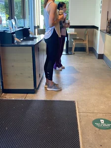 Hot blonde getting coffee