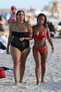 Christina Milian in red bikini in Miami with hard nipples