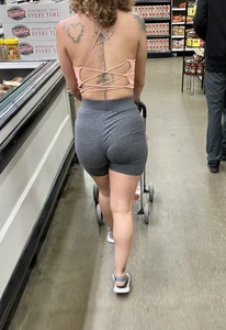 Tiny Latina in tight spandex shorts
