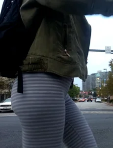 College girl in striped leggings walking with nice ass