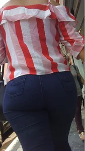 Lady walking in tight jeans with a big booty and slight vpl