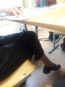 College candid teens' flats under desk, dangle creepshots