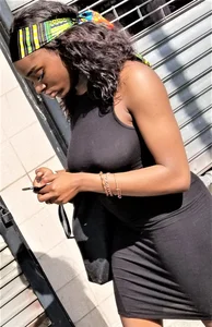 Sexy braless ebony babe in tight skirt with pokies