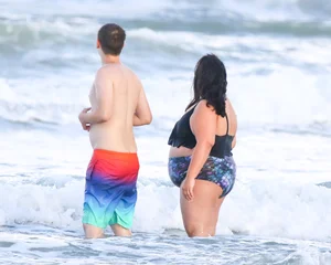Extra thick girl at the beach in a bikini