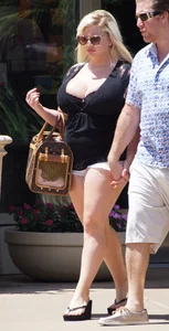 Thick blonde with big boobs in short white shorts