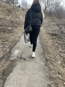 Blonde girl wearing tight pants walking down the road creepshots