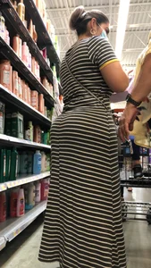 Beautiful Latina with amazing body in long dress