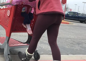 Target milf with a decent ass in maroon leggings
