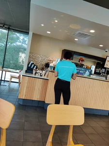 A Fit Candid Girl in Leggings With Muscly Legs Cafeteria Creepshot