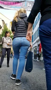 Big booty blonde babe walking in tight jeans