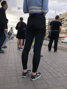 Skinny Girl in Tight Black Jeans on the Bus Stop Candid Photos