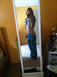 Cute Teen Pulling Up Her T-Shirt And Pulling Down Pants Flashing Boobs And Panties - Home Selfie in a Mirror