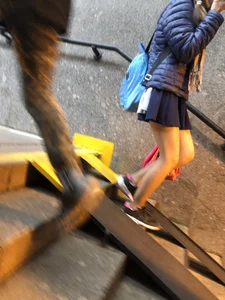 Girl With Skinny Legs in Pahtyhose and a Skirt Walking Down the Stairs Street Candid Gallery