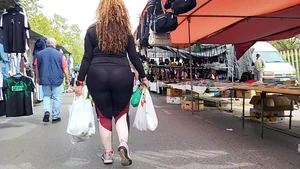 Milf with a tremendous hot ass in the market