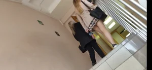 Couple of college girls walking up the stairs, creepshot from below - one wearing a mini-skirt, hot legs