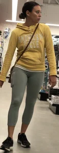 Brunette milf in light colored leggings