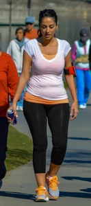 Thick lady walking in leggings with a big booty