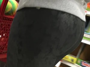 Target blonde milf with a nice ass in dark leggings