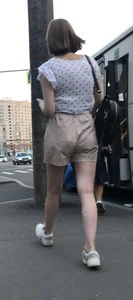 Cute Girl in a Blouse and Shorts With Thin Legs Bus Stop Candid Photo Gallery