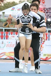 Bunch of athletic Thai cheerleaders at a competition