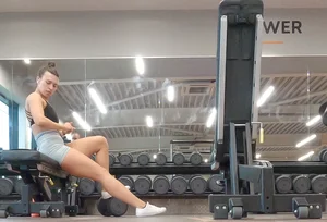 Gym brunette in tight grey shorts bending over, part 3