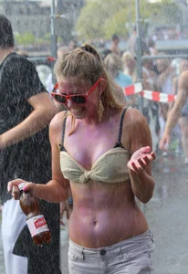 Boobs out in public in either bikini tops or bras