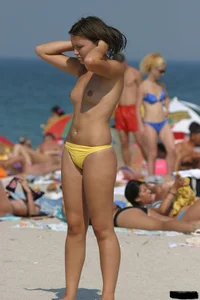 Sexy candid topless and nude beach girls