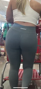 Amazing ass on shopper in leggings