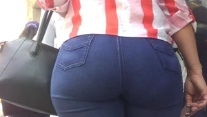Lady walking in tight jeans with a big booty and slight vpl