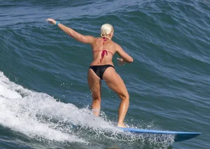 Candid surfer babes on the beach and in bikinis