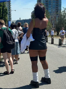 Cheeks hangin’ out of little black skirt