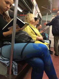 Girl in Blue Spandex Tights Reading in the Subway Train Candid
